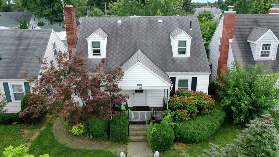 Cape cod home before new roof installation