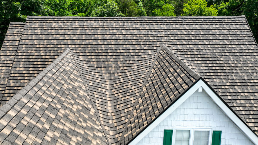 Home roof after new dimensional asphalt shingle installation